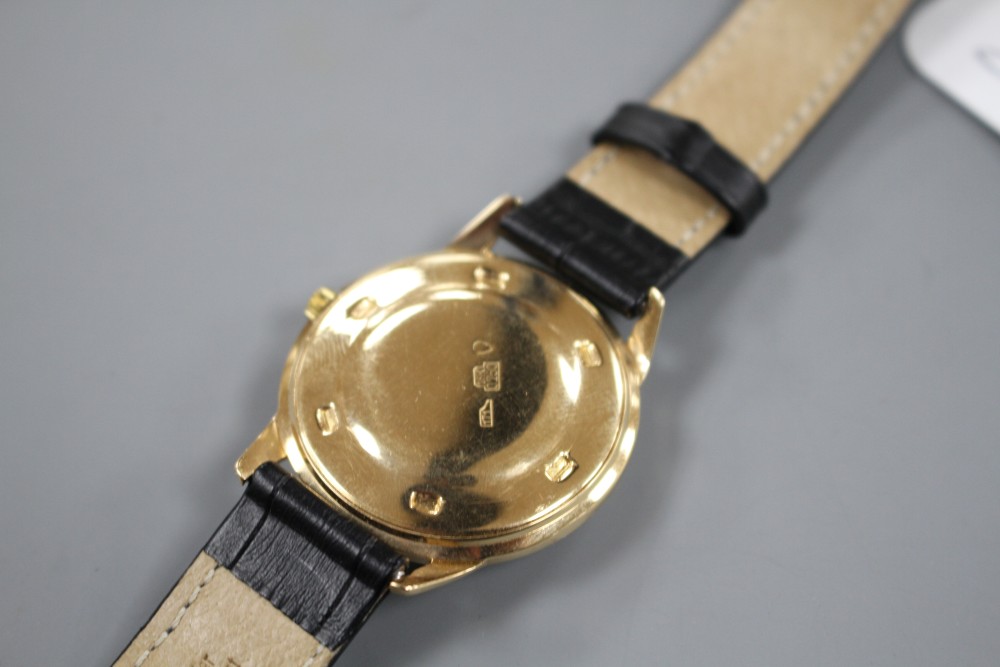 A gentlemans Swiss 18k yellow metal Fleurier automatic wrist watch, with later associated leather strap.